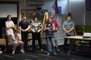 Students presenting to the Board